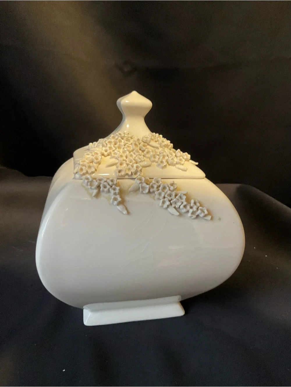 Ivory Ceramic Decorative Covered Jar with Floral Appliqué